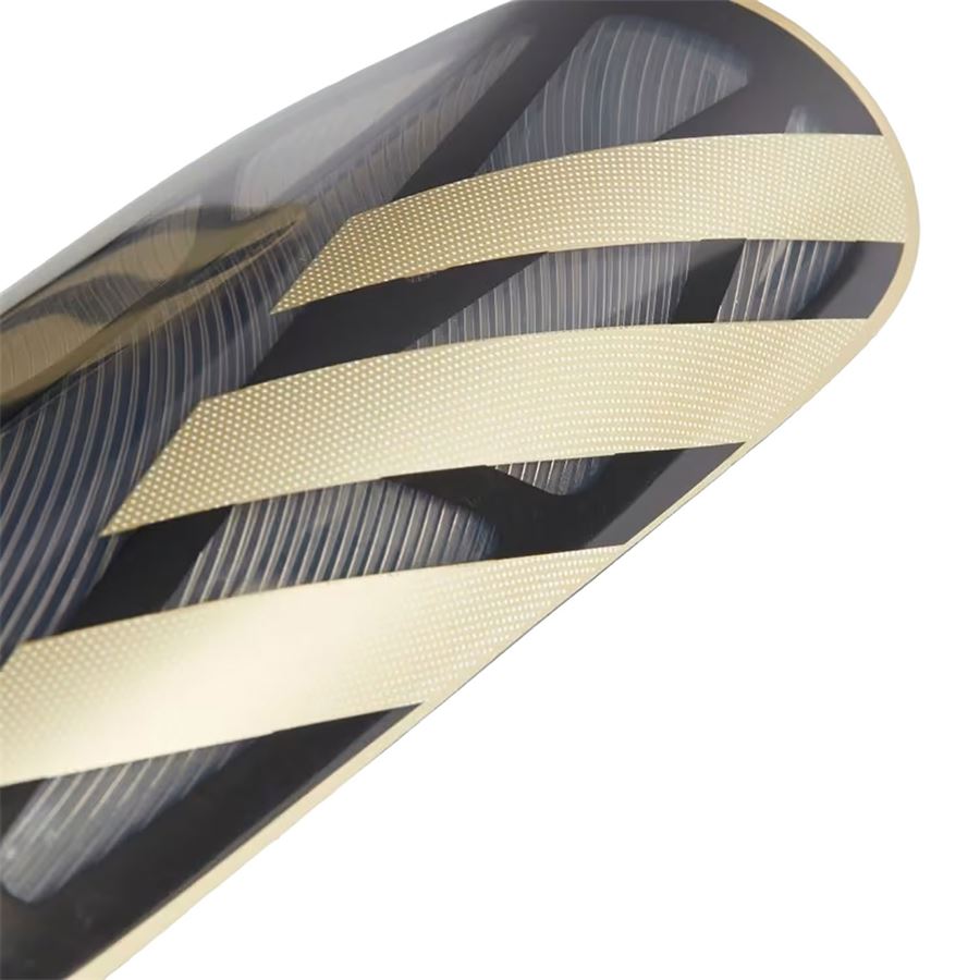 TIRO SG LGE Parastinchi con fasce a compressione. Adidas | IP4000X